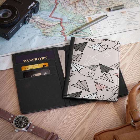 Travel-Inspired Passport Cover with Paper Airplanes Design