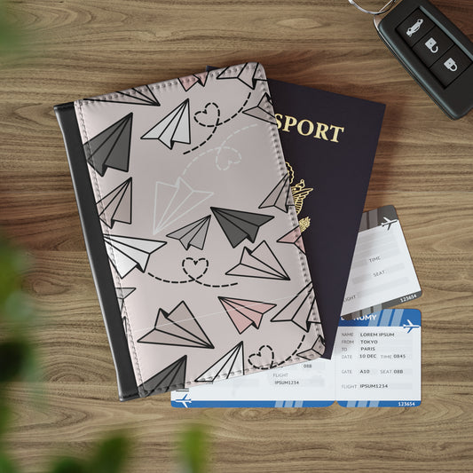 Travel-Inspired Passport Cover with Paper Airplanes Design